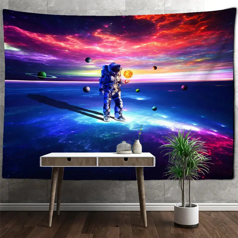 Vibrant decorbites astronaut moon tapestry wall hanging featuring a blue spacesuit astronaut on a glowing planet