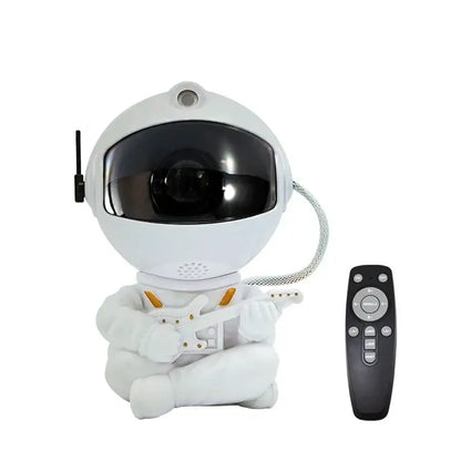 White and gold astronaut night light decorbites galaxy star projector holding a miniature guitar for bedroom use