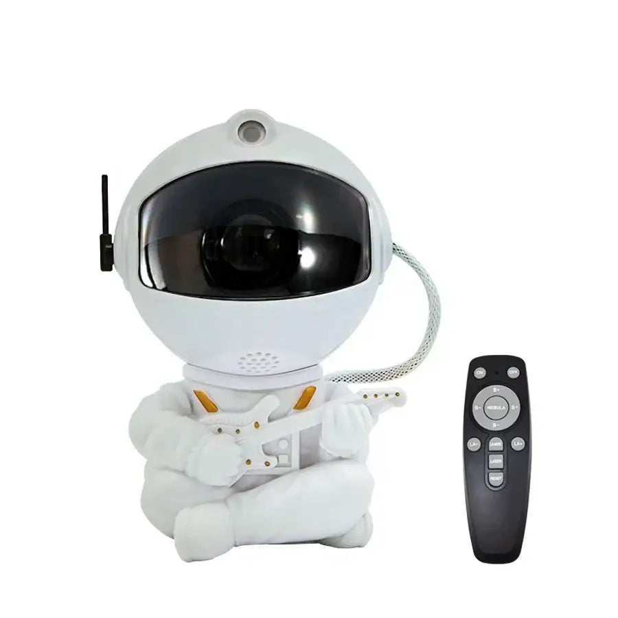 White and gold astronaut night light decorbites galaxy star projector holding a miniature guitar for bedroom use
