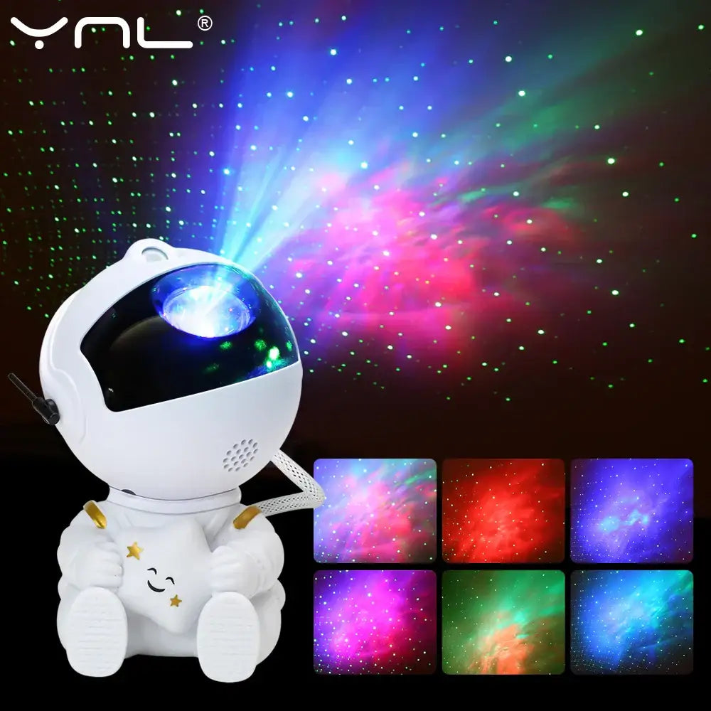 White astronaut galaxy star night light with smiling face and gold accents projecting colorful cosmic patterns