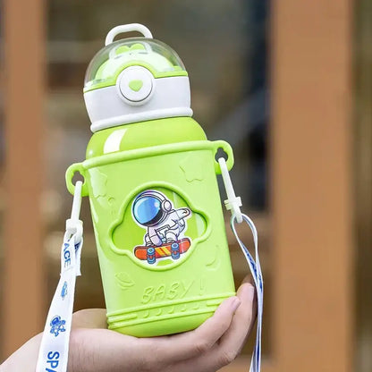 Bright lime green stainless steel thermos bottle for kids with white lid cartoon straw and astronaut sticker strap
