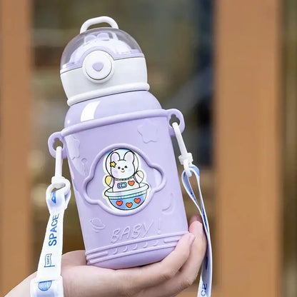 Lilac plastic thermos bottle with white lid and astronaut bunny sticker featuring cartoon straw for kids room use