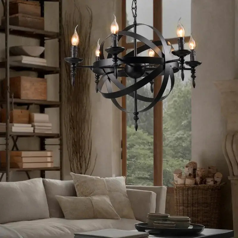 Black wrought iron pendant light chandelier with eight lit candle style bulbs for living room decorbites iron pendant