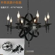 Black wrought iron pendant light with atomic orbital design and eight candle-style bulbs for living room decorbites iron pendant