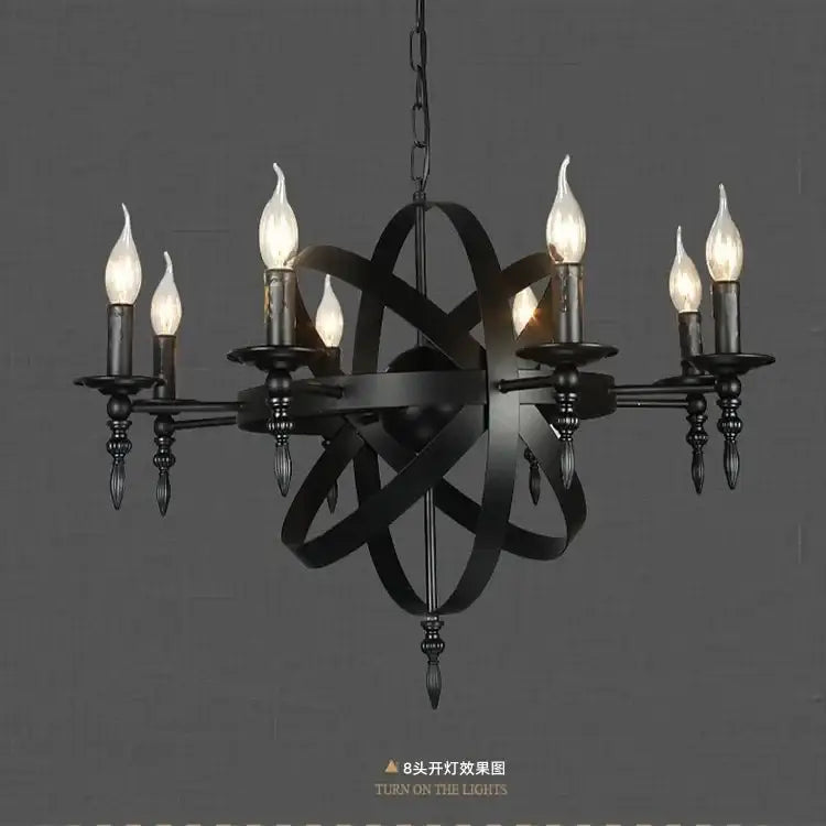 Black wrought iron pendant light with eight candle-style bulbs in an atomic orbital design for living room decorbites iron pendant
