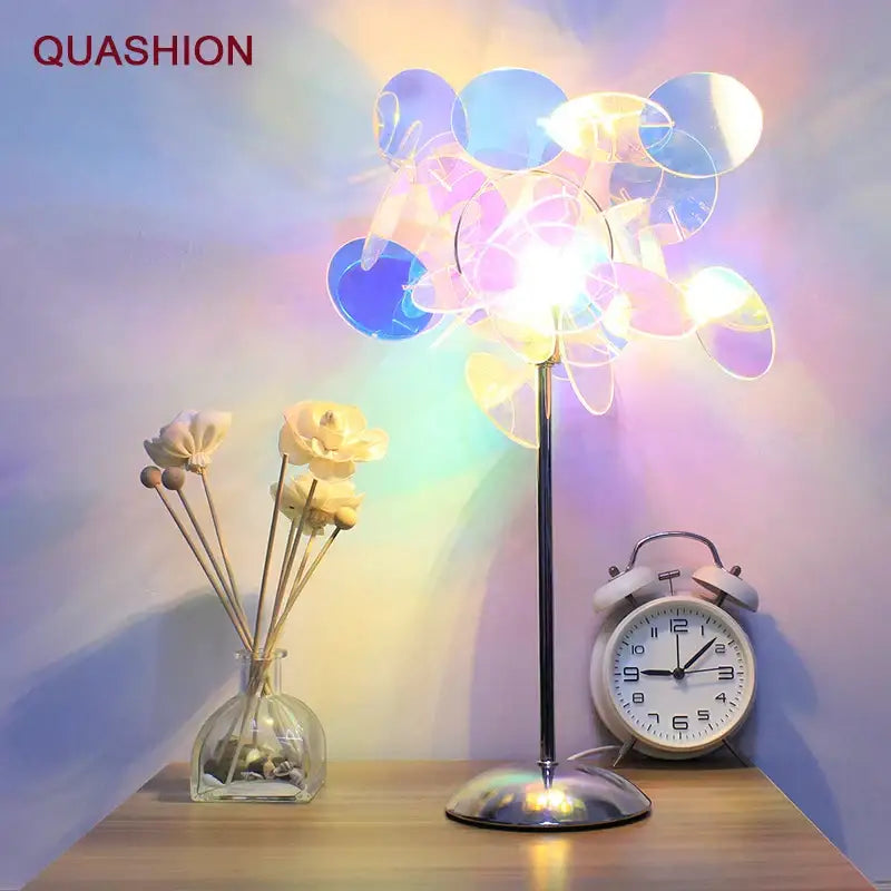 Quashion aurora acrylic projection lamp with slender metallic stand and illuminated blue and purple acrylic discs