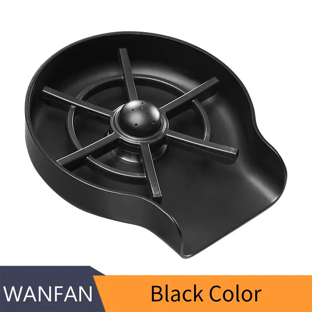 Black plastic automatic cup glass rinser with central perforated sphere and radial arms for home bar sink use