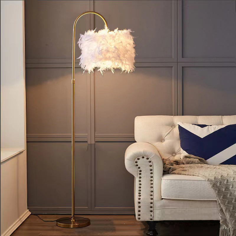 Gold Feather Floor Lamp With Curved Design
