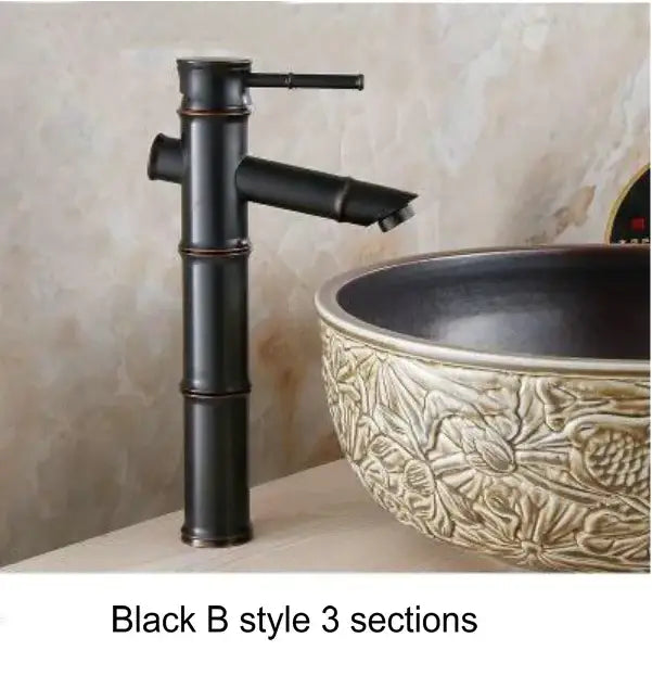 Black b-style basin mixer tap with three sections, matte finish, and copper accents for bathroom use