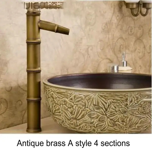 Antique brass basin mixer tap with bamboo-inspired design featuring four distinct sections for bathroom use