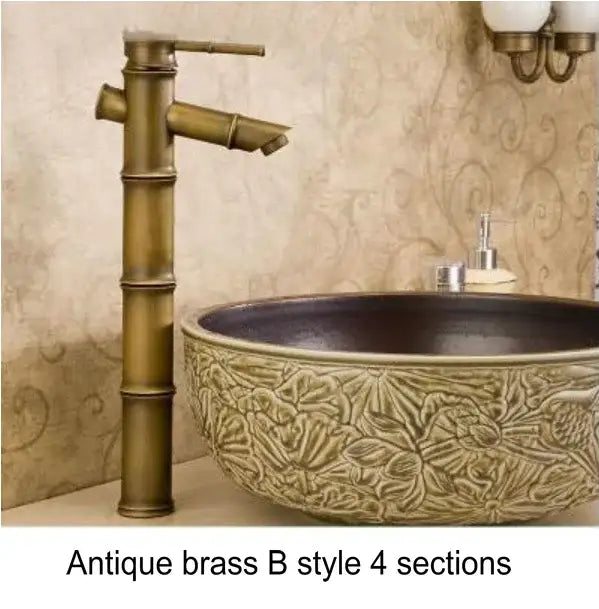 Antique brass basin mixer tap with bamboo-inspired design and four sections for bathroom basin mixer use