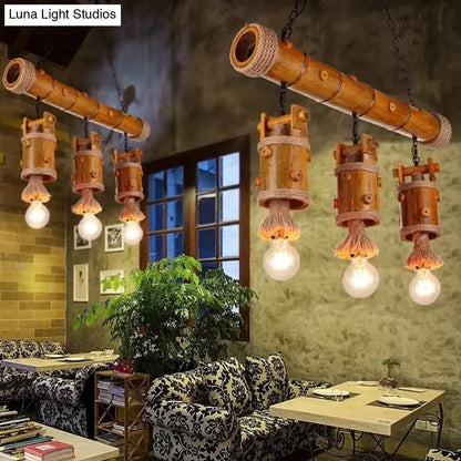 مصباح معلق على شكل دلو صيني من الخيزران من DecorBites™ - وحدة إضاءة ريفية بثلاث لمبات على شكل جزيرة باللون البني مع لمسة من الحبل