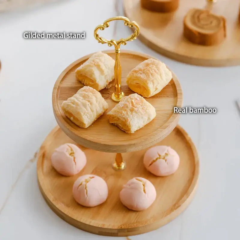Two-tiered bamboo fruit cake stand with gilded metal accents for elegant dining room dessert decorbites bamboo fruit