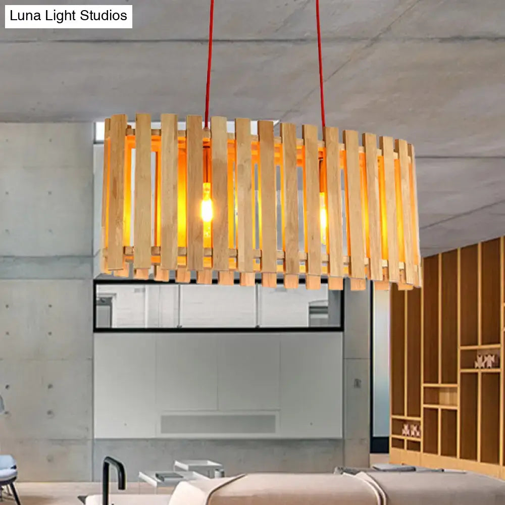 Warm-toned bamboo linear island pendant lamp with wooden oval shade and red cords for dining table lighting