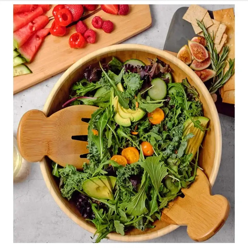 Wooden salad bowl with matching fish shaped bamboo salad hands and spoon set by decorbites for dining use