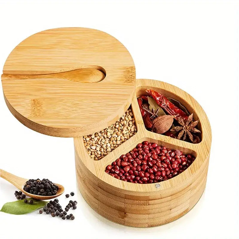 A round light brown bamboo seasoning box with three compartments and a matching lid with integrated spoon handle