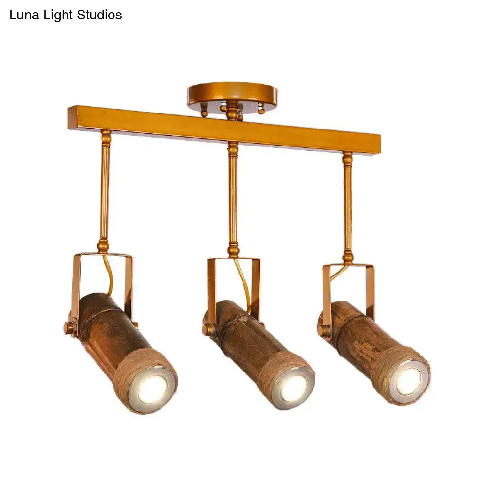 Gold-toned DecorBites 3-bulb bamboo tube pendant light with hemp rope and brown iron suspension for led light use