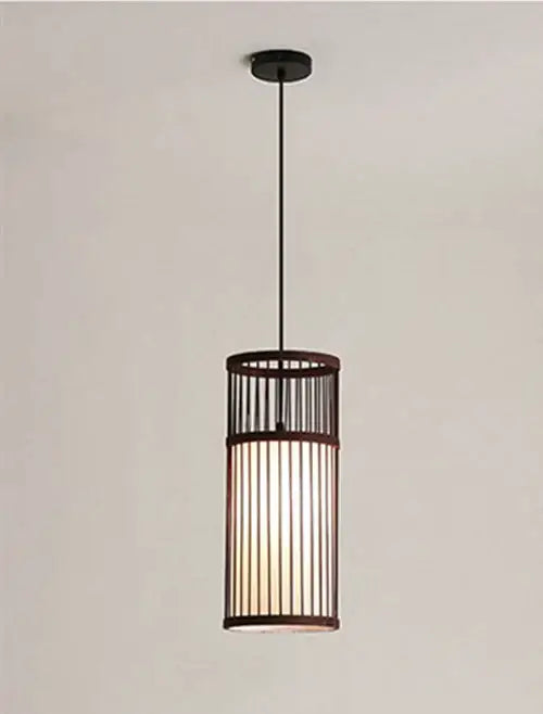 A modern dark brown bamboo wooden pendant lamp e27 with vertical slats emitting warm ambient glow for kitchen bar