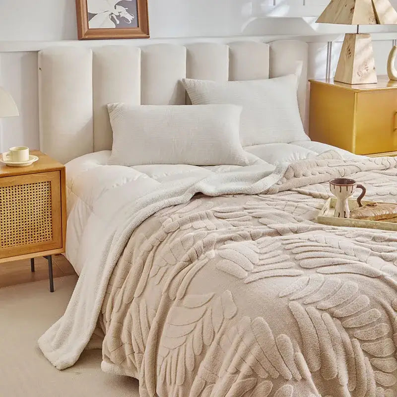 Beige bedroom throw blanket made of banana leaf jacquard faux rabbit fur with raised leaf jacquard pattern