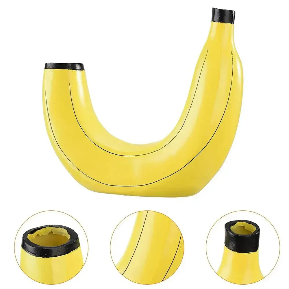 A glossy yellow banana shape resin flower vase with black caps and subtle ridges mimicking a natural banana