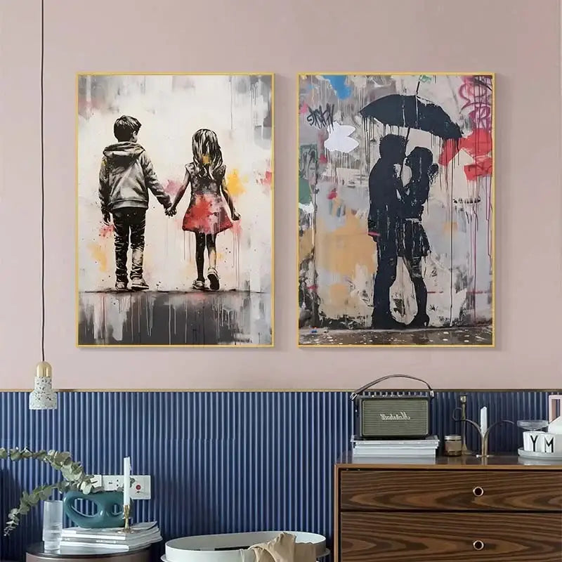 Two framed decorbites™ banksy boy girl balloon canvas print artworks with street art style and splattered paint effects