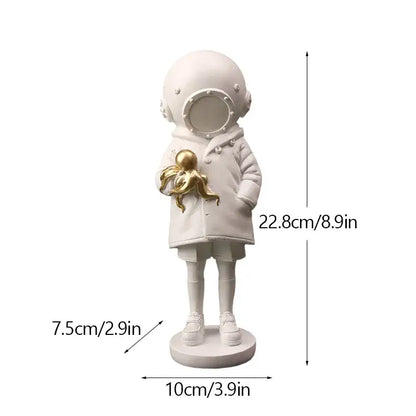 White resin astronaut figurine holding golden octopus from banksy sculpture collection black and white decor