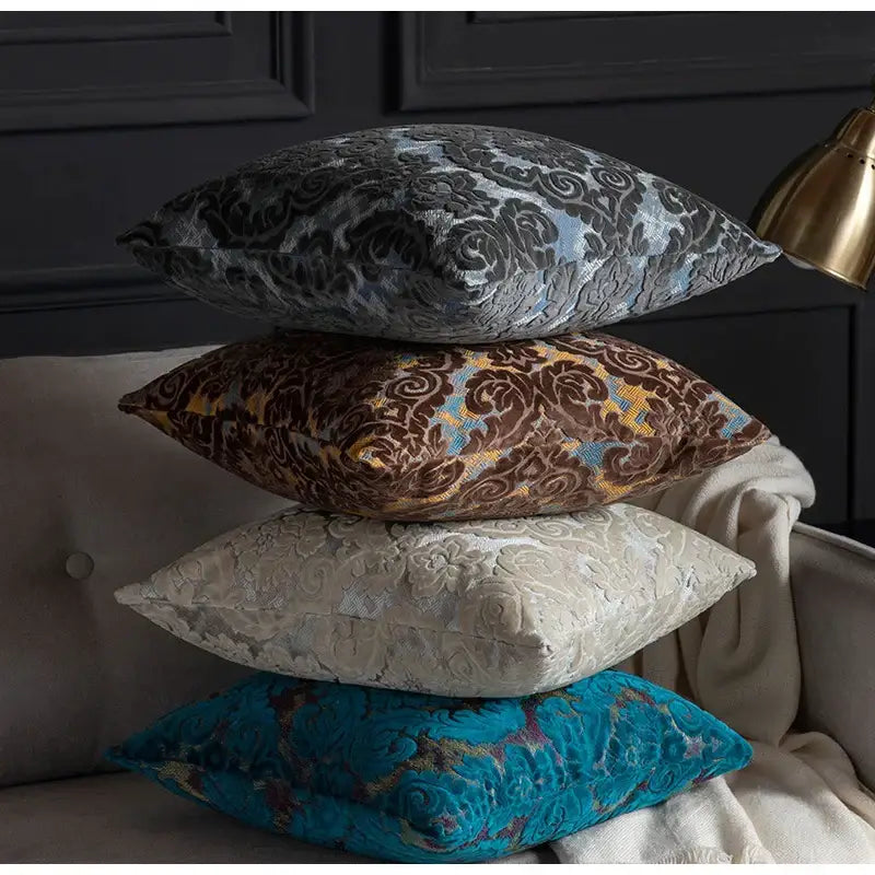 Stacked baroque beige and silver damask cut velvet cushion covers in gray-blue brown-gold cream and teal for living room decorbites damask cut velvet