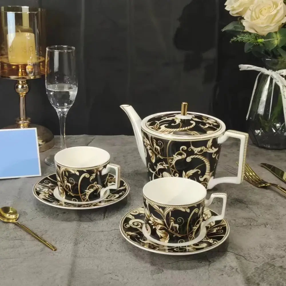 Black and gold ornate porcelain tea set with intricate baroque patterns from black unicorn series kitchenware collection