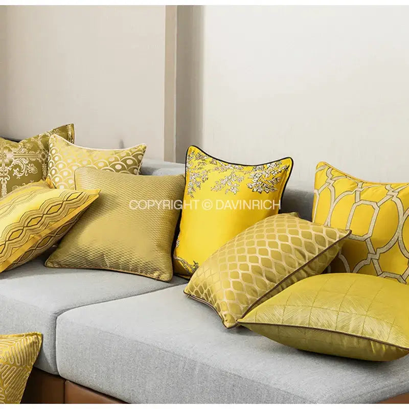 A collection of vibrant yellow cushion covers with gold and silver baroque floral geometry embroidery for decorbites living room decor