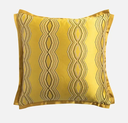 A vibrant yellow satin cushion cover with metallic gold and silver baroque floral geometry embroidery for decorbites decor