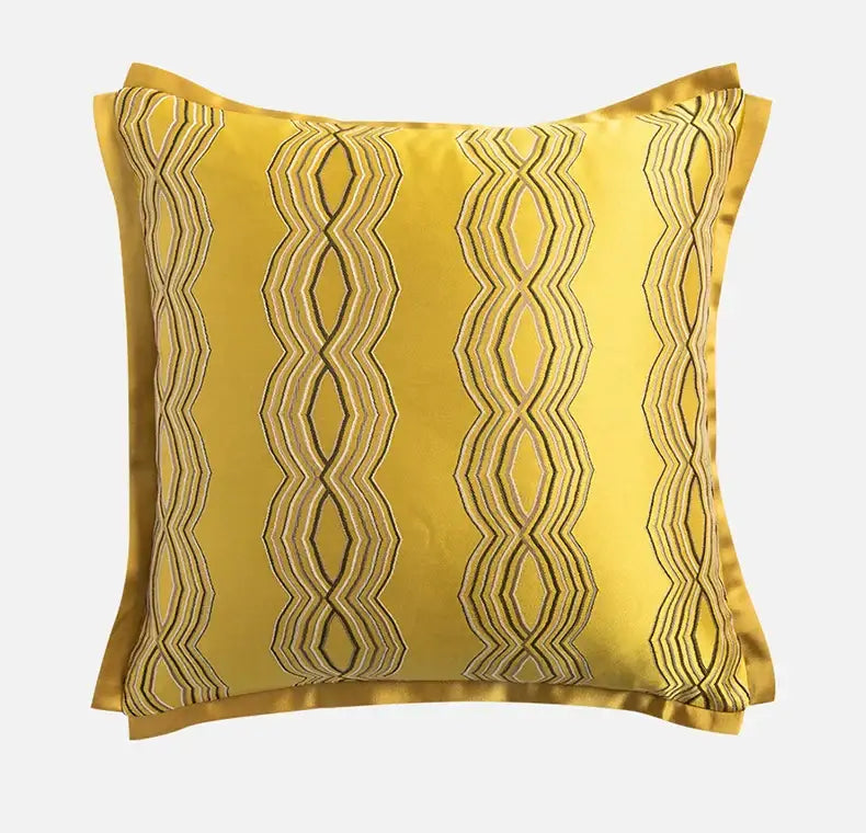 A vibrant yellow satin cushion cover with metallic gold and silver baroque floral geometry embroidery for decorbites decor