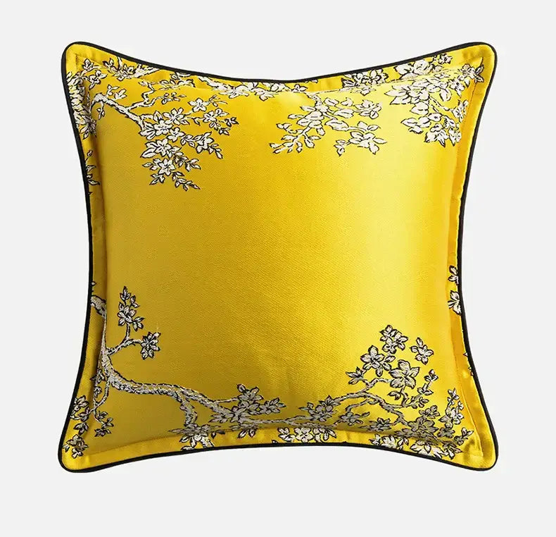 Vibrant yellow satin cushion cover with delicate white floral branch embroidery and black border for decorbites baroque floral geometry living room decor