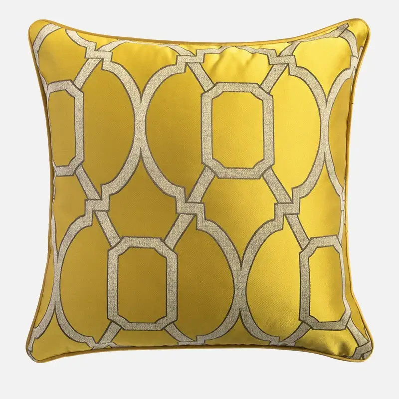Vibrant yellow satin cushion cover with metallic silver baroque floral geometry for living room decor by decorbites