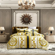 Luxury versace-inspired bedding set with bold gold and navy blue baroque patterns on 1200tc golden egyptian cotton