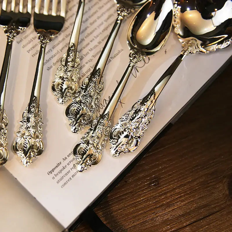 Elegant decorbites baroque silver cutlery set 10 pcs with ornate baroque handles and polished reflective bowls for dining room
