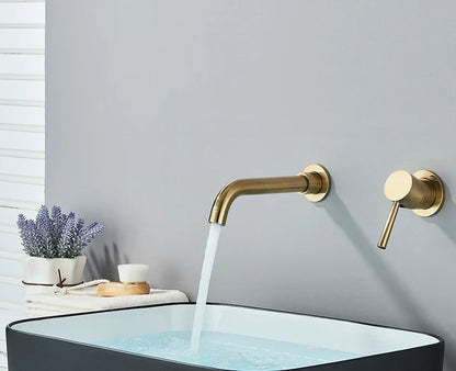 Modern brass-finished basin faucet wall mounted with brushed brass finish and hot water control for cold hot water use