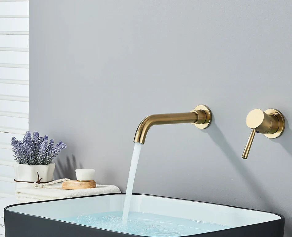 Modern brass-finished basin faucet wall mounted with brushed brass finish and hot water control for cold hot water use