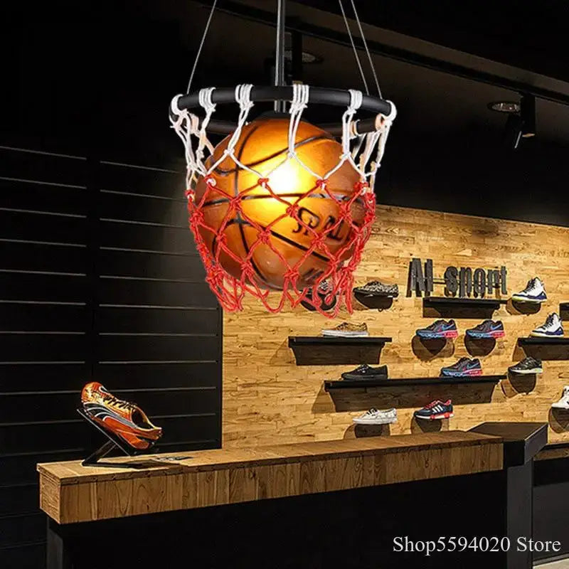 Basketball pendant lights featuring a glowing orange ball with red and white netting perfect for bedroom and living room decor
