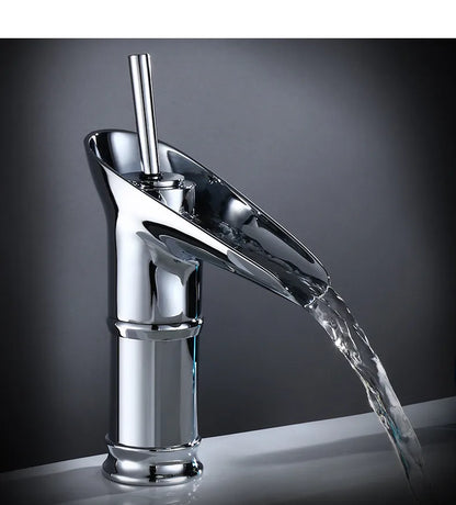 Chrome finished deck mounted bathroom faucet with bamboo inspired base and metered valve control for waterfall flow