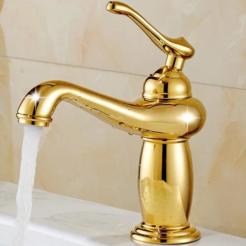 Golden brass-finished single-handle bathroom faucet with curved spout and elegant bronze finish for bathroom use