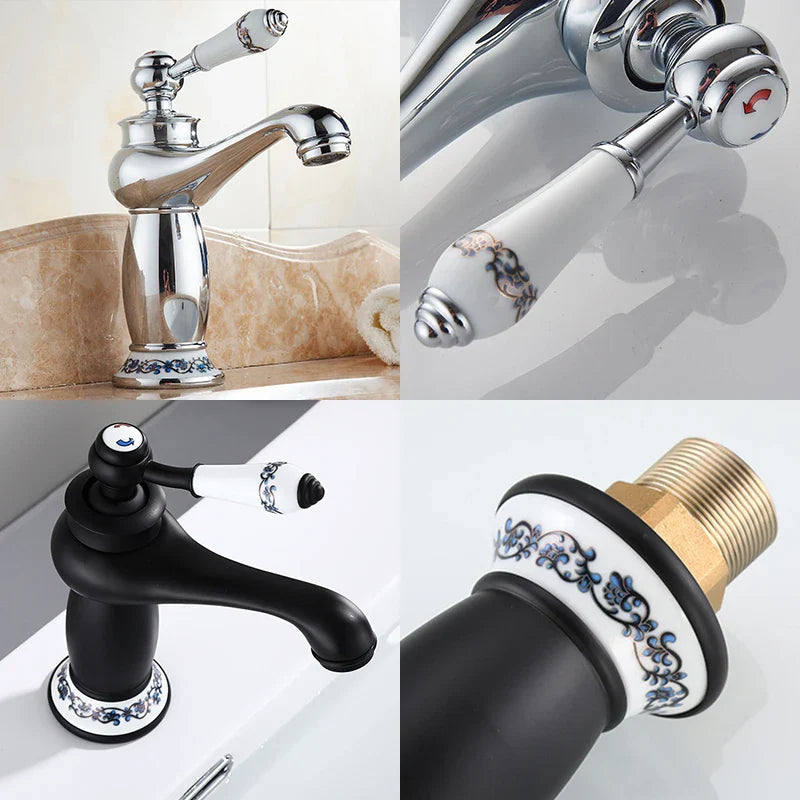 Bathroom faucet with chrome and white ceramic handle featuring ornate blue floral detailing and antique bronze finish base