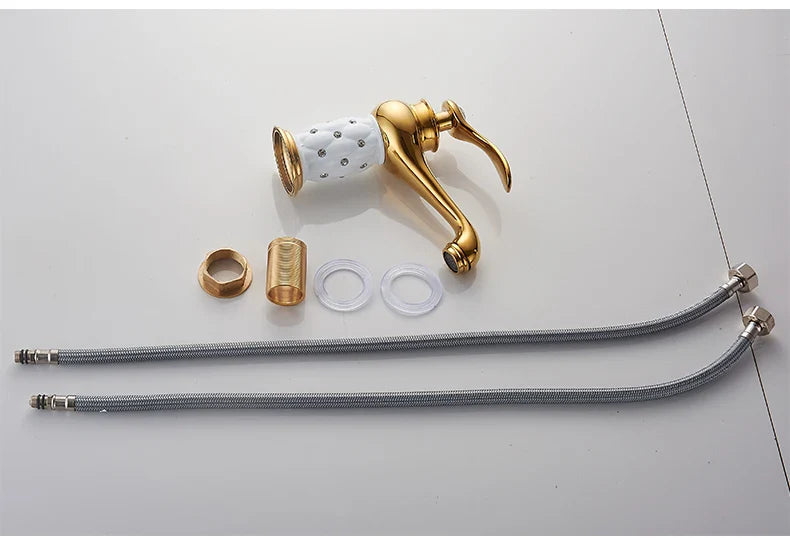 Bathroom faucet antique bronze finish with gold-finished ceramic spout featuring decorative perforations and brass hardware