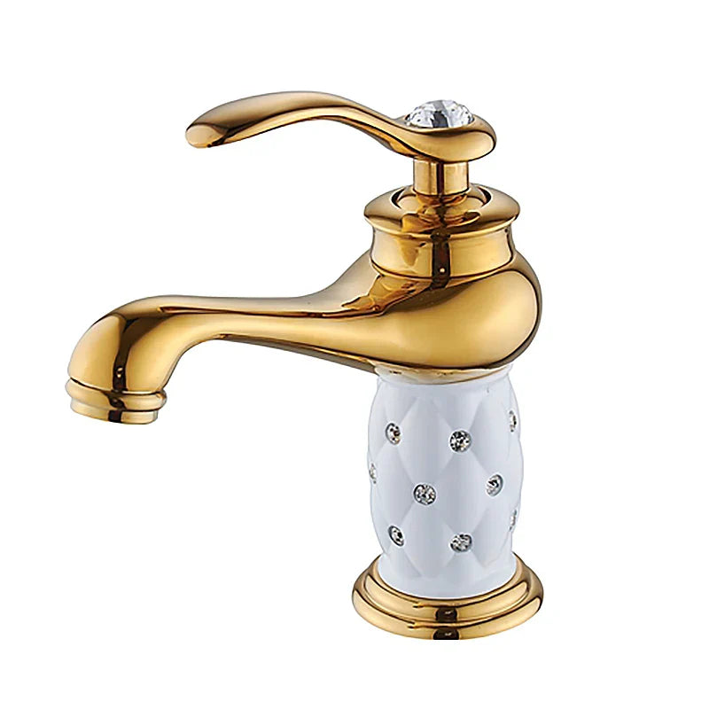 Bathroom faucet with antique bronze finish featuring gold-finished spout and white ceramic base with embedded crystals