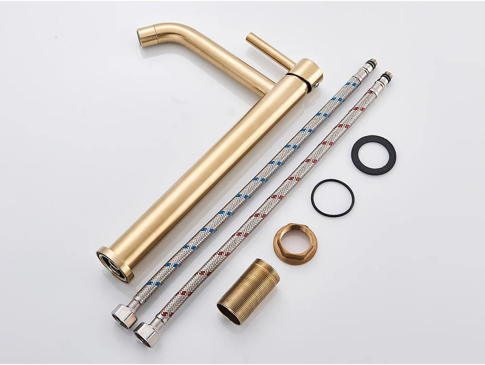 Bathroom faucet brushed gold mixer tap with gold-toned modern minimalist design and matching brass-colored hardware