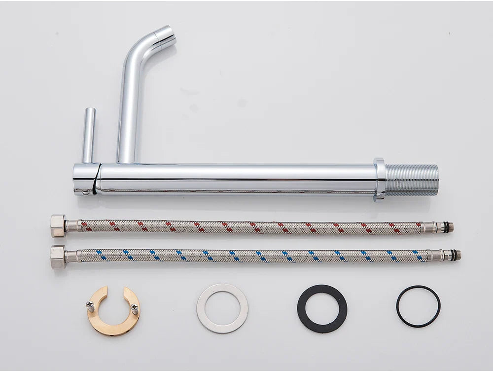 Bathroom faucet brushed gold mixer tap with chrome finish and two braided hoses with red and blue stripes visible from back side