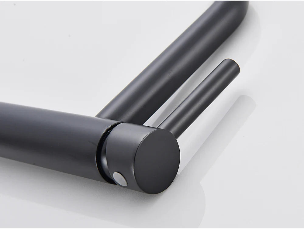 Black matte finished bathroom faucet with sleek cylindrical spout and handle for mixer tap use