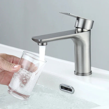 Modern brushed stainless steel bathroom faucet with sleek minimalist design for deck-mounted installation