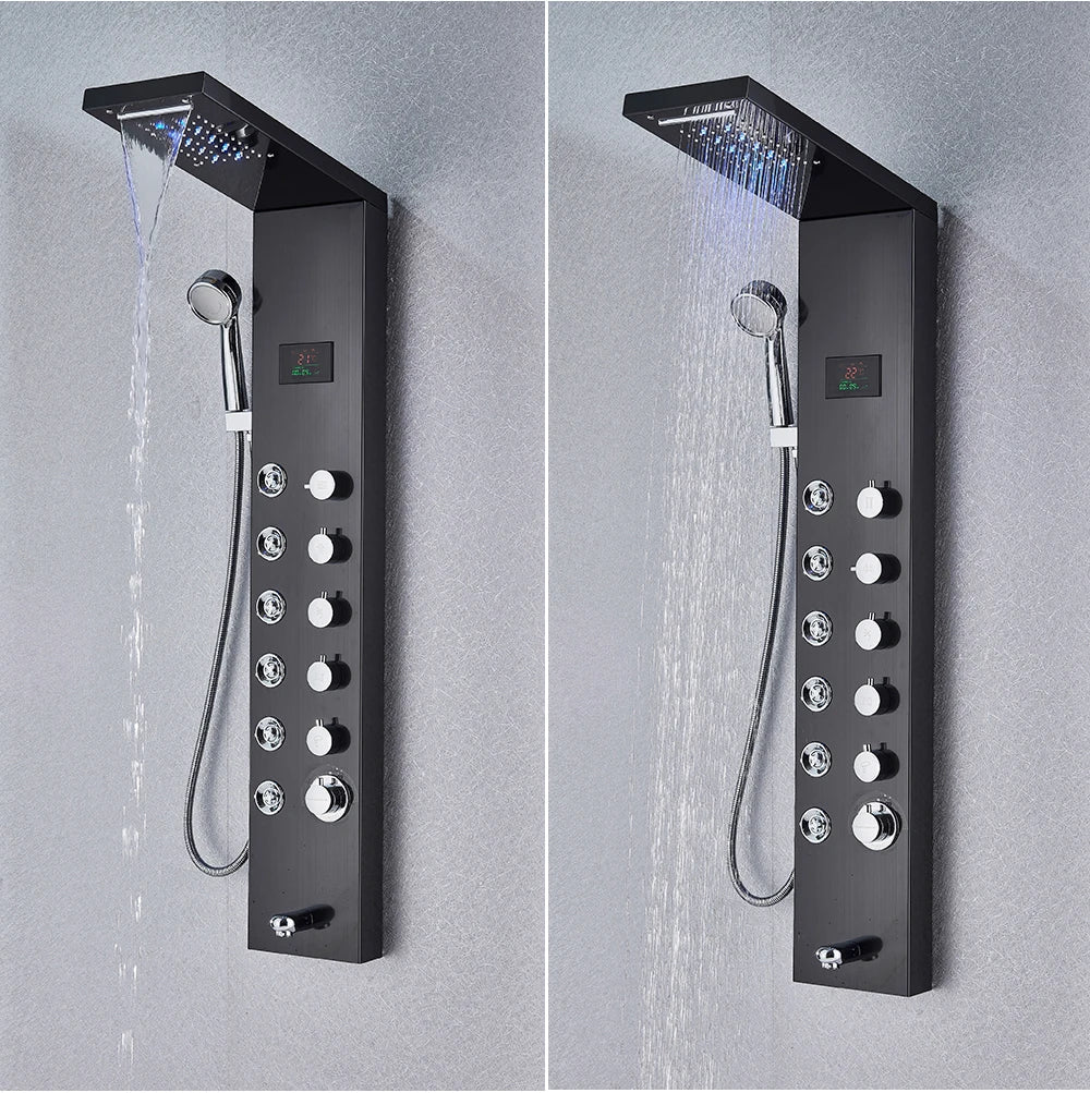 Black matte-finish bathroom shower panel set led with multiple control knobs and handheld spray nozzle for rain shower use