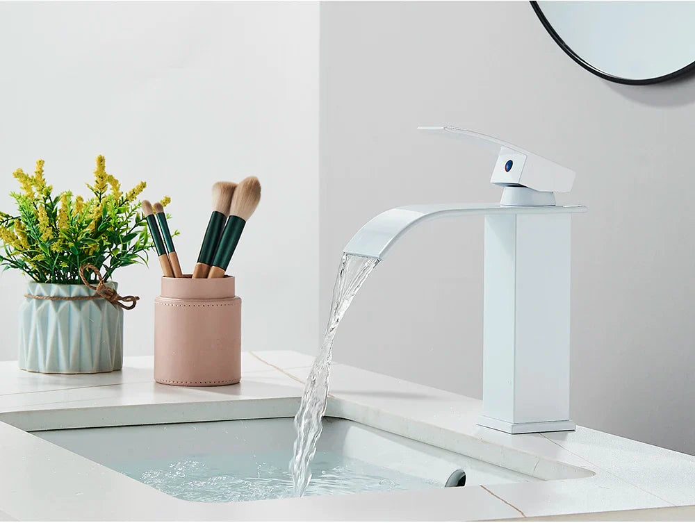 Modern white brass deck mount bathroom sink faucet with sleek minimalist design and stainless steel accents
