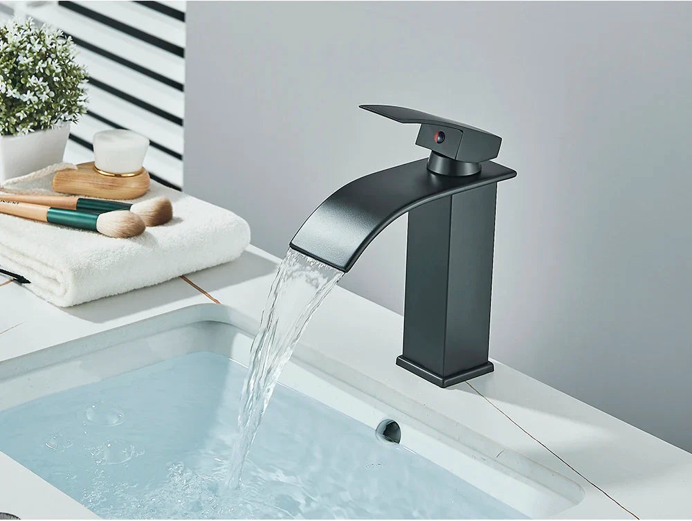 Black matte-finish bathroom sink faucet brass deck mount with sleek modern waterfall design and stainless steel features